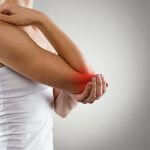 Woman suffering from chronic joint rheumatism