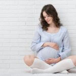 Portrait of the young pregnant woman